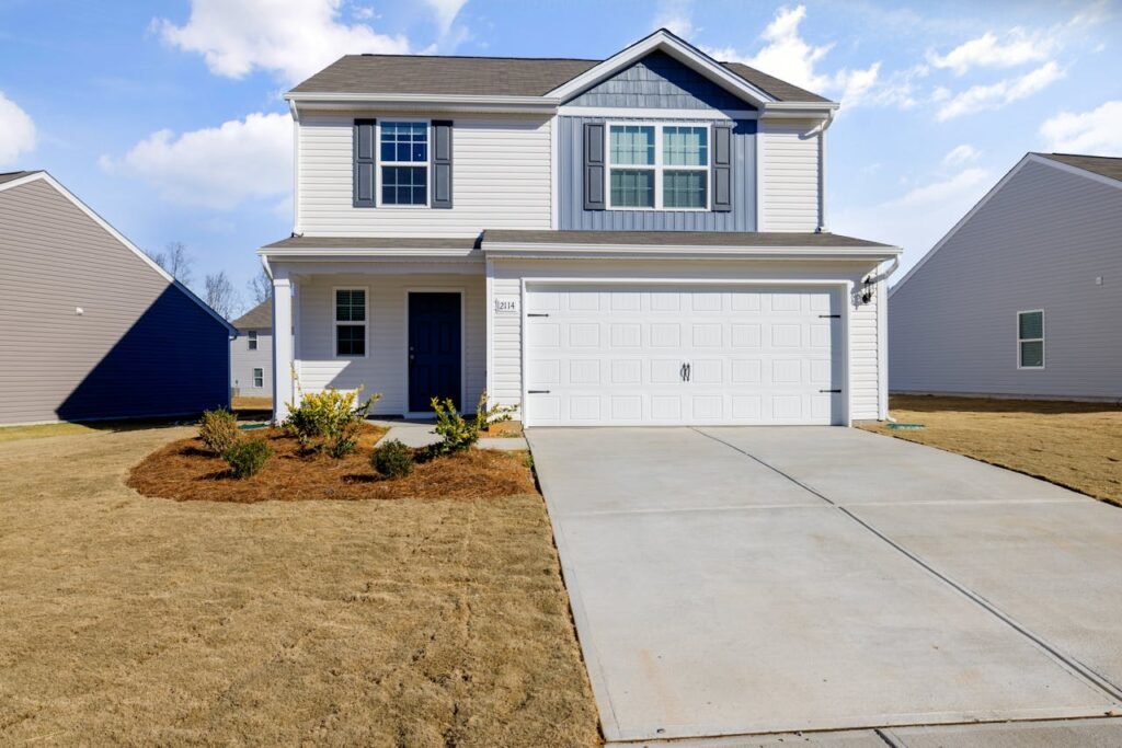 White and Blue House Under Blue Sky fix by Garage Door Repair Kent, WA